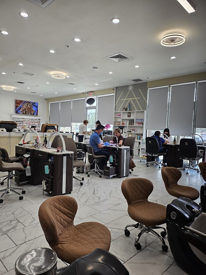 The clean, marble-floored salon floor at A & J Nails Spa